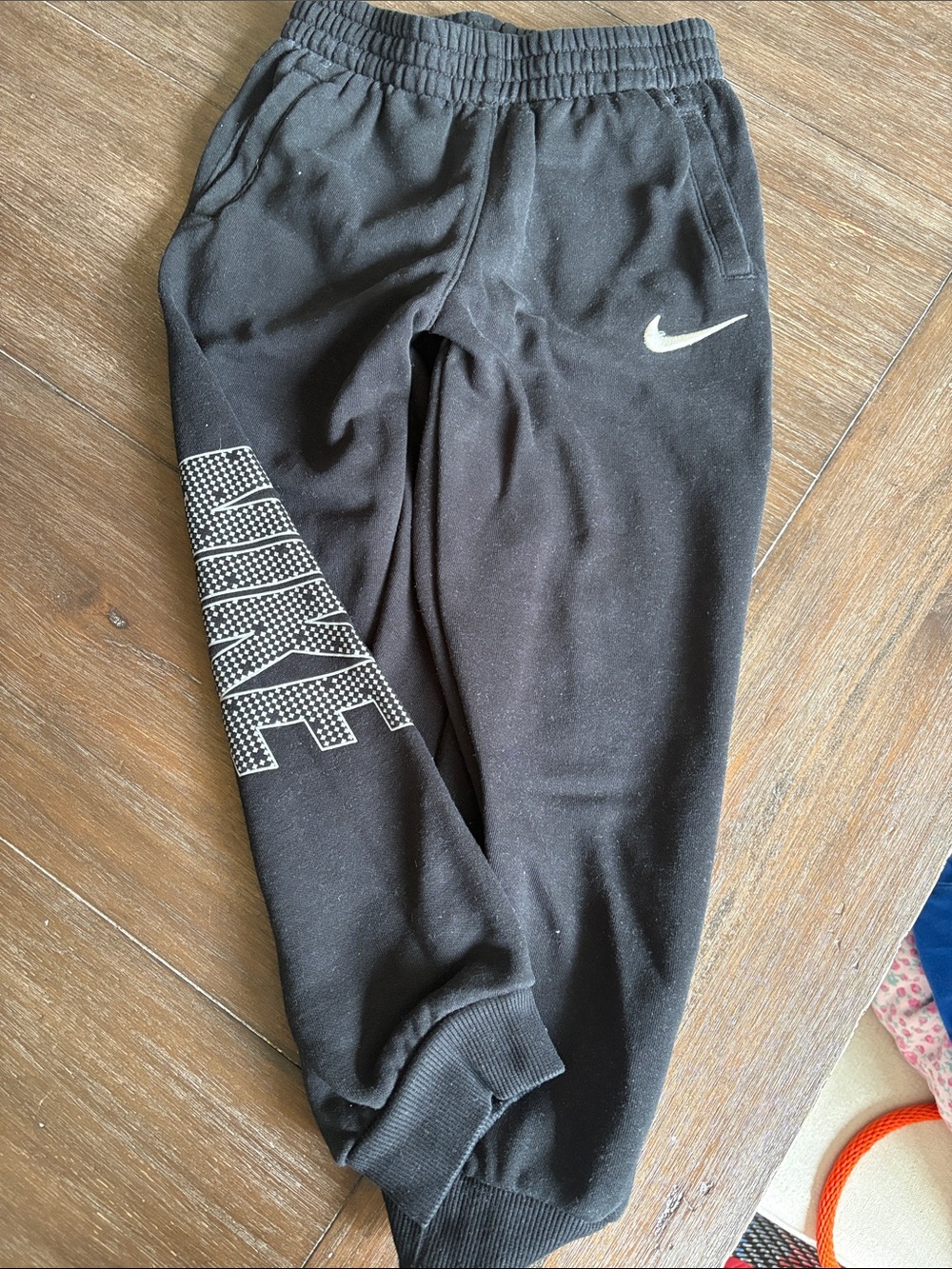 Nike Black Kids Joggers with White Swoosh and Side Script